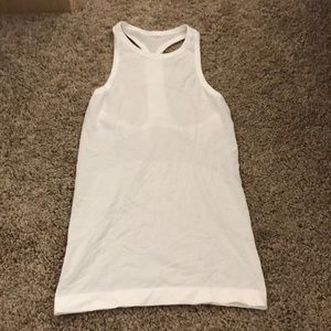 white lululemon tank top.